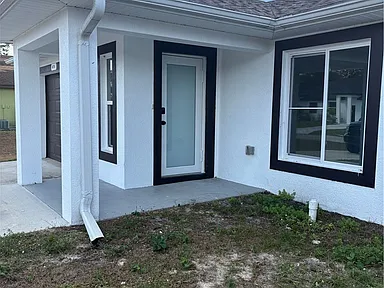 Covered front entry and front windows
